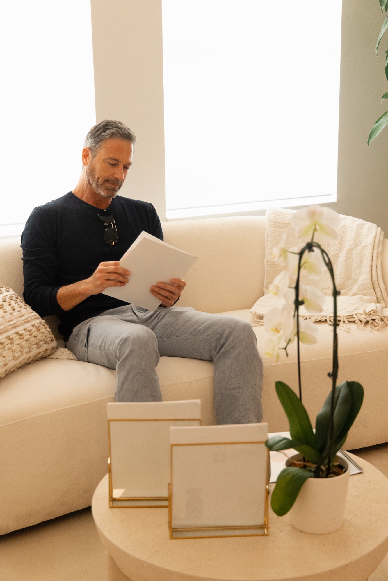 A SÖRCE patient reviewing his personalized plan in warm natural light